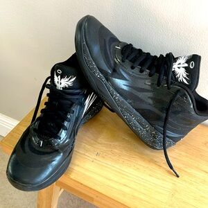 Size 11 Mens Puma Mello Hightop Sneakers Black and white